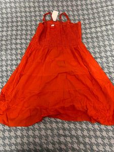 Vibrant Orange Smocked Tiered Dress