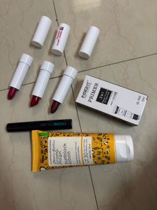 unused 3 lipsticks, primer, eyeliner and slightly
