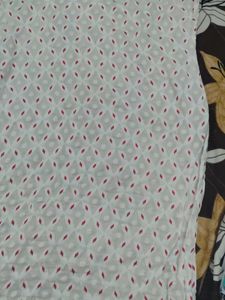 Elegant White Saree with Red Motifs