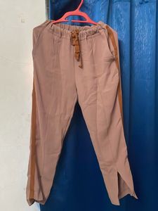 Stylish Women's Taupe Trousers with Brown Stripe