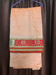 Elegant Peach saree with Red Border