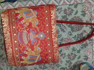 Embroidered Elephant Red Clutch