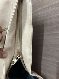 Stylish Beige Hobo Bag with Boho Strap