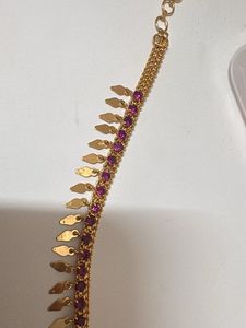 Gold necklace (elakkathali) with Red Stones