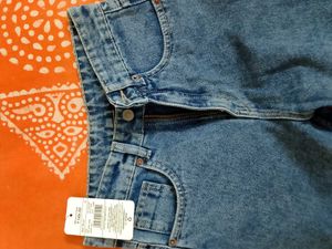 Distressed Blue Denim Jeans