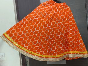 Pretty White And Orange Coloured Lehenga