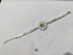 Elegant Pure Silver Rakhi with Enamel