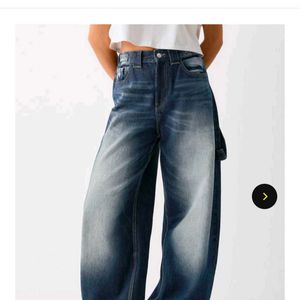 blue carpenter jeans with adjustable straps