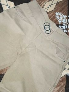 Stylish Beige Trousers with Buckle Detail