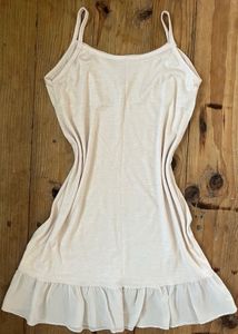Chic Cream Slip Dress with Ruffle Hem