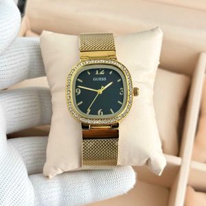 Gold Guess Watch with Crystal Bezel