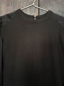 Chic Black Dress with Sheer Sleeves
