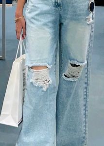 Light Wash Ripped Wide Leg Jeans