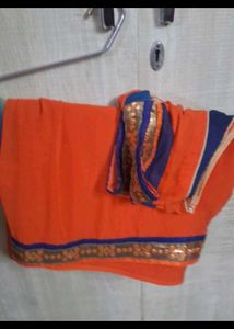 Vibrant Orange Saree with Embellished Border