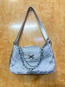 silver shoulder bag