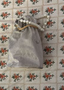Elegant Pearl Embellished Potli Bag