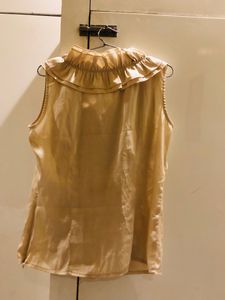 RUFFLE TOP BY IORA IN L