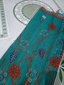 Sea Green Printed Saree With Unstitched Blouse