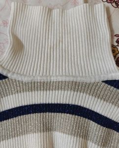 Striped Turtleneck Sweater with Ruffle Trim