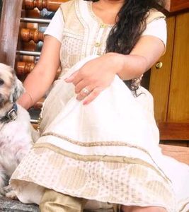Elegant Cream Kurta Set with Gold Embellishments