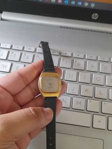 Vintage Gold Tone Watch with Black Leather Strap