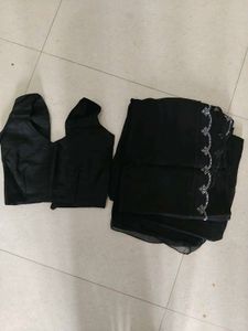 Elegant Black Saree with Scalloped Border
