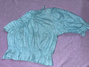 Ruffled Off-Shoulder Blouse.