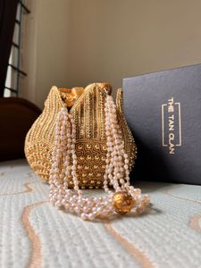 Elegant Gold Embellished Potli Bag
