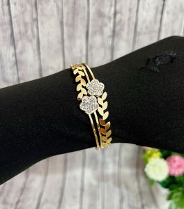 Elegant Gold Flower & Leaf Bracelet
