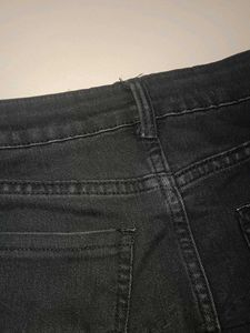 pleted denim black skirt