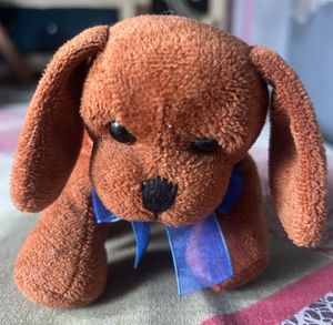 Cute Brown Plush Dog Toy with Blue Bow