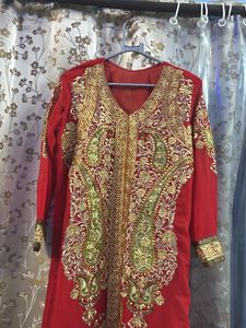 Festive wear red Pakistani suit with chudidar pant