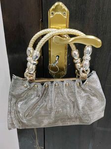 Elegant Silver Embellished Clutch