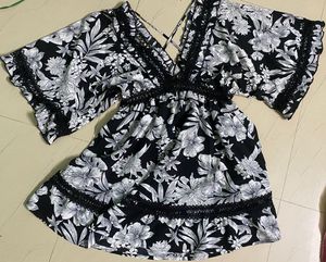 foral deep v neck dress with cross back design