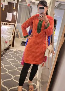Orange Printed Kurta with Green Neckline