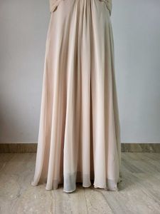 Elegant Chiffon Gown with Floral Accent