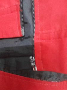 Red Hooded Jacket with flaw zip is not working