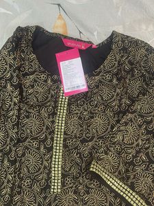 Black kurti and Green dress