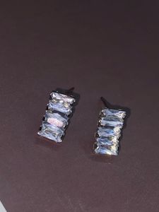 Elegant Silver Stud Earrings With Stones