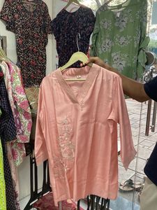 Elegant Pink Kurti with Embroidered Details