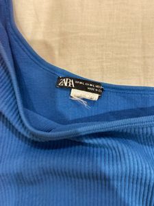 Zara’s Electric Blue One-Shoulder Top