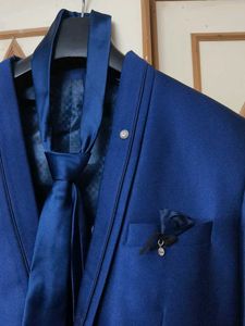 Men's Blue Suit with Tie and Pocket Square