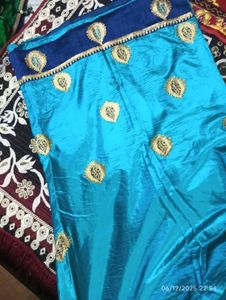 Beautiful Turquoise Saree with Gold Embroidery