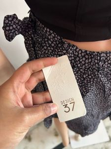 Chic Black Floral Mini Skirt