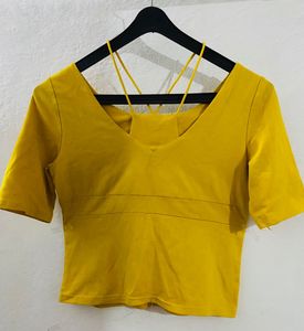 yellow crop top