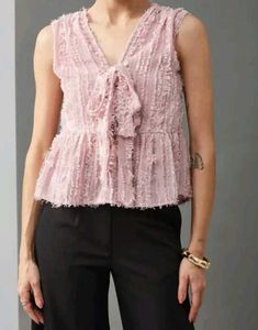Chic Pink Peplum Top with Bow Detail