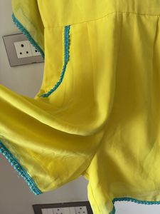 Vibrant Yellow jumpsuit with Teal Trim