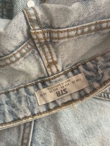 light washed distressed denim shorts