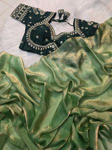 Elegant Green Silk Saree with Embellished Blouse