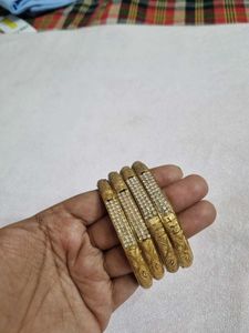 Set of 4 Golden Bangles with Rhinestones